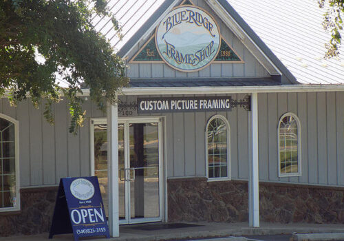 Front of Blue Ridge Framing Company store with a sign that says 