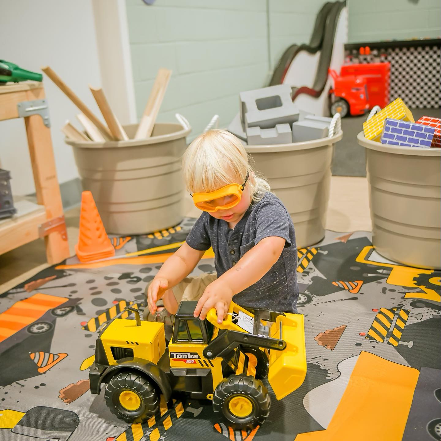 Child playing with truck