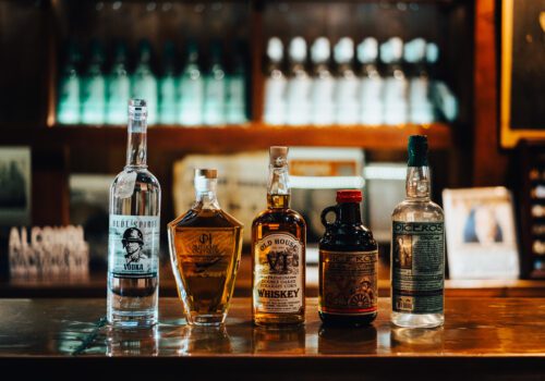 five bottles of spirits Image