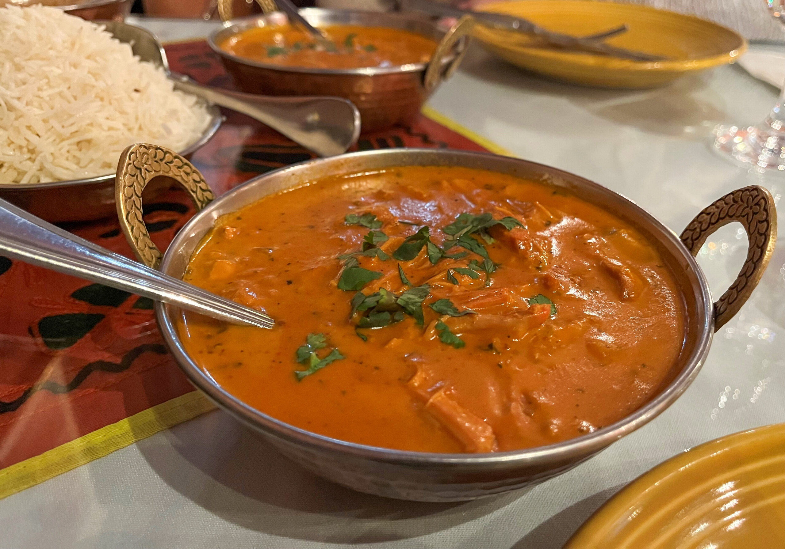 metal bowl with Butter Chicken